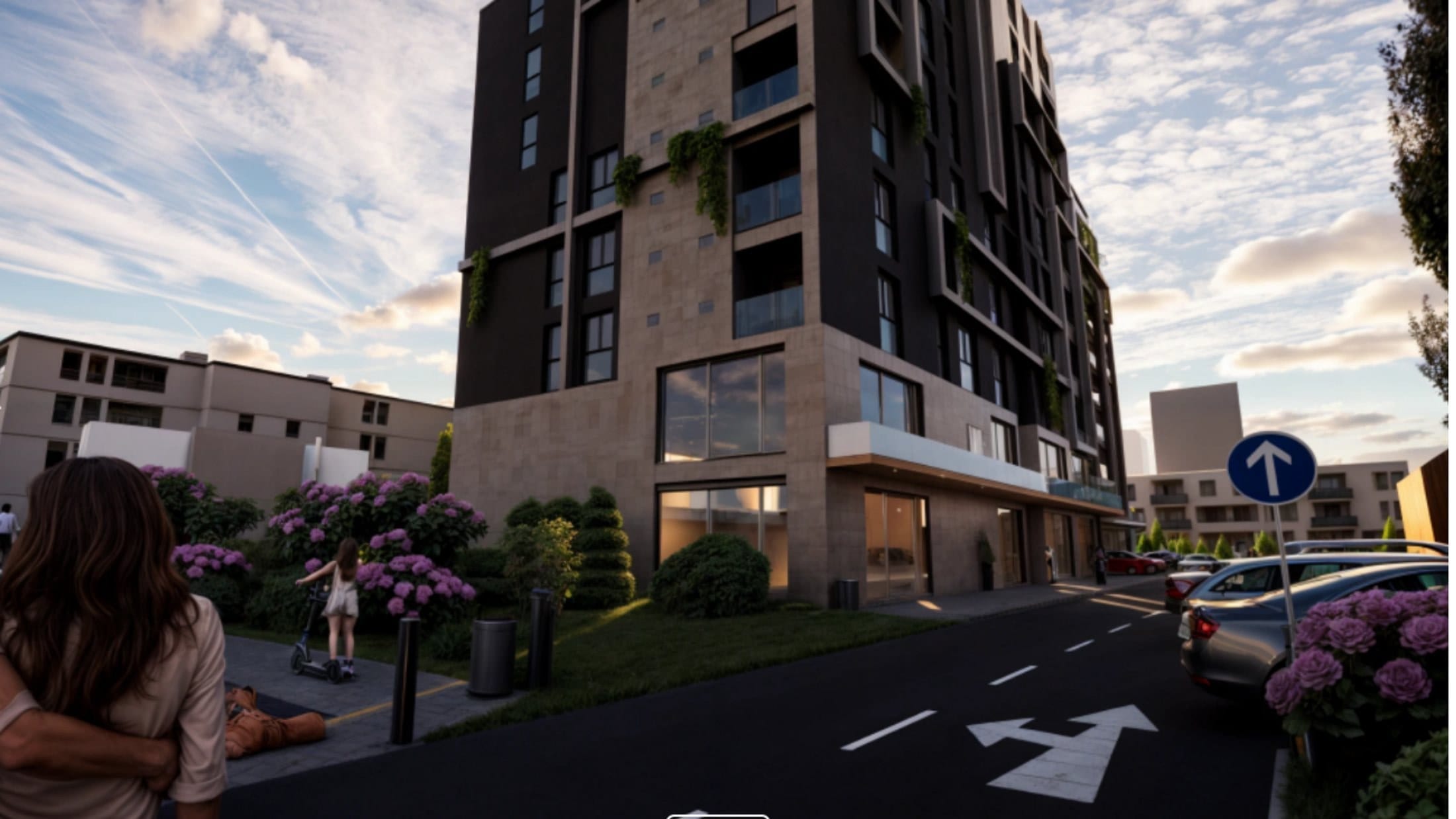 Street-level view of Elysium Series 1 showing the entry podium, planting and pedestrian crossing.